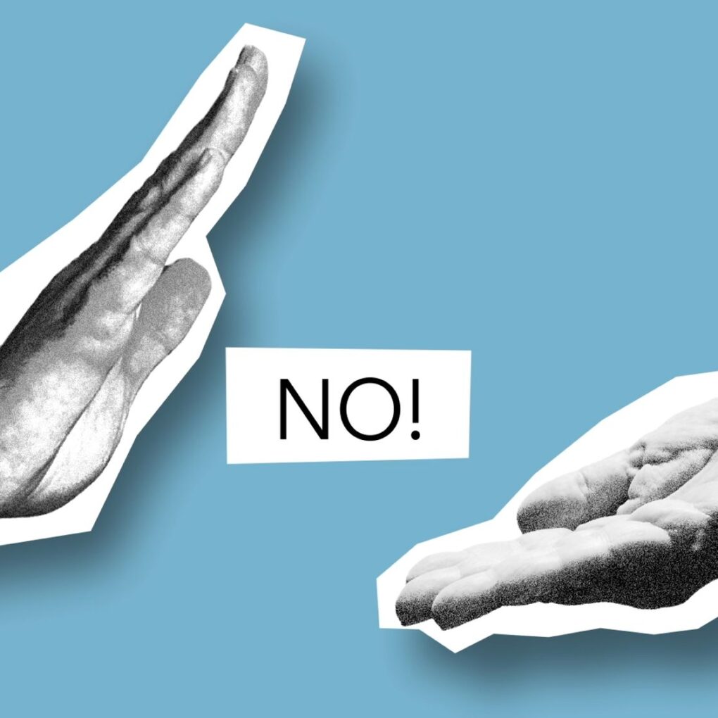 Blue background with collage hands showing a 'NO!' message symbolising disagreement.